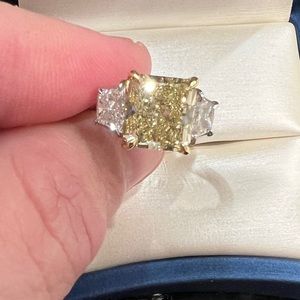 Over 5ct fancy yellow diamond solitaire set in platinum. GIA